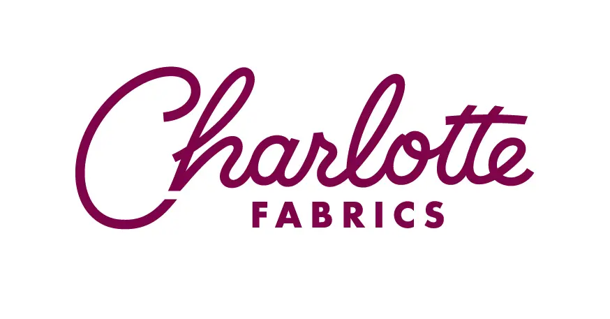A logo of charlotte fabrics for the company.